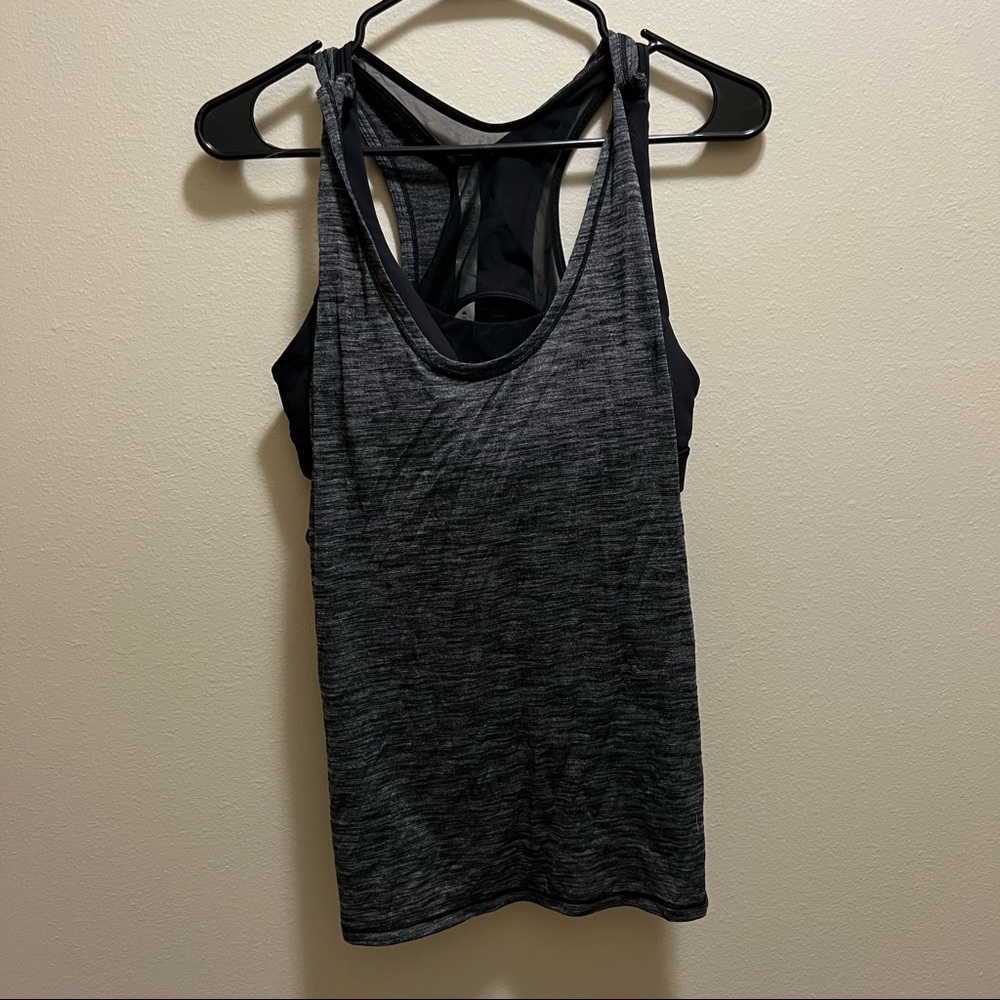 Lulu lemon tank with built in bra! Runs a size small.